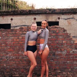 two dancers in two-piece sets